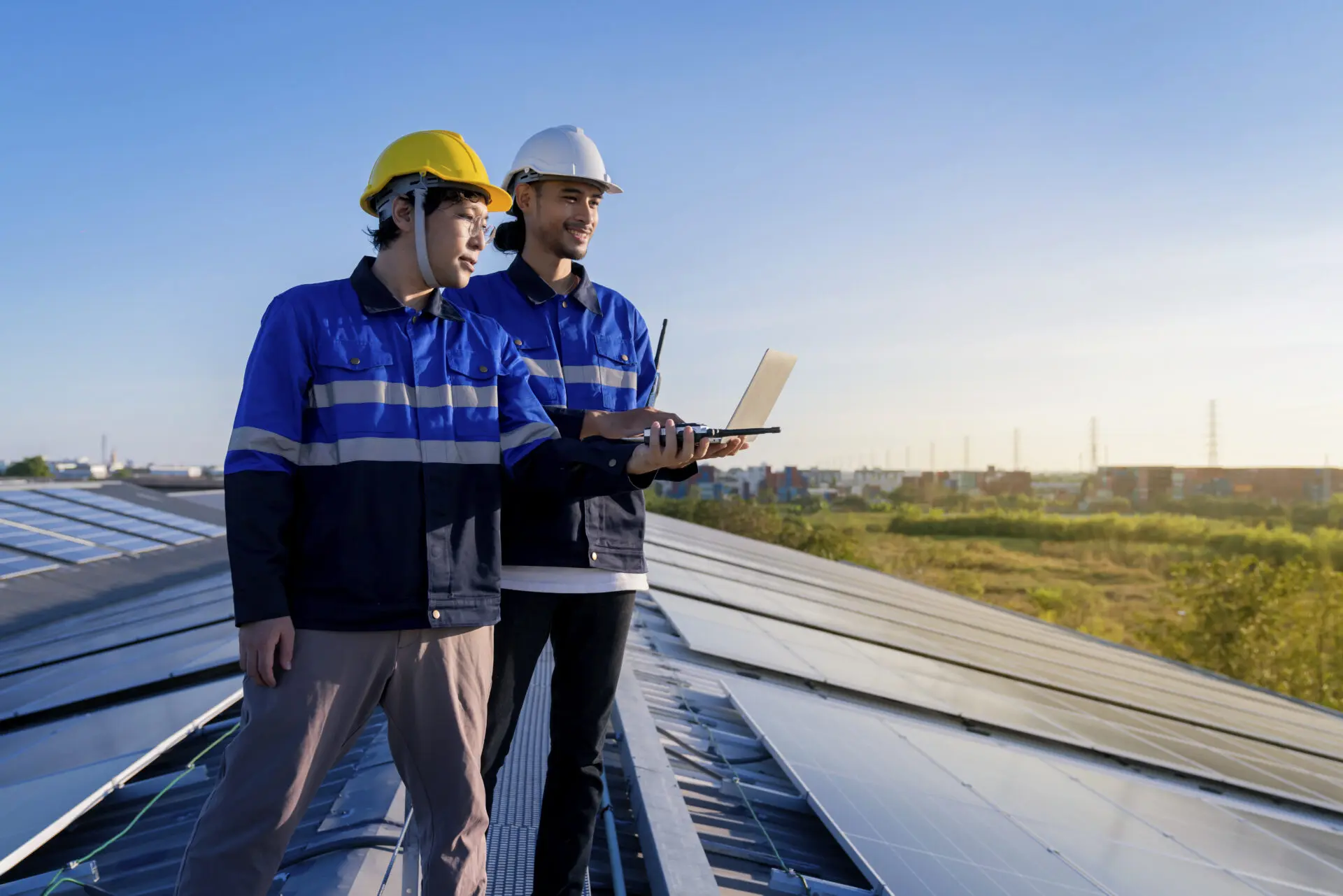 Solar specialists on rooftop